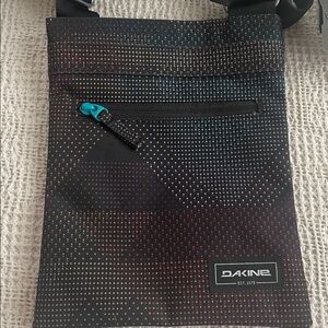 Dakine Multicolor Dotted Messenger Bag
NWT. Style is Jive Stella. Black blue red